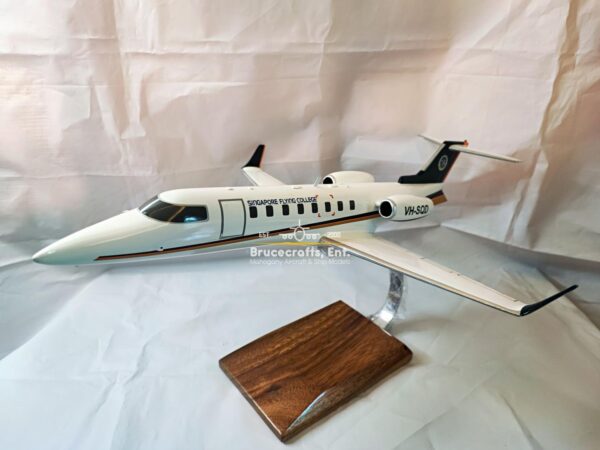 Model of Learjet 45 Singapore Fying College with detailed craftsmanship.